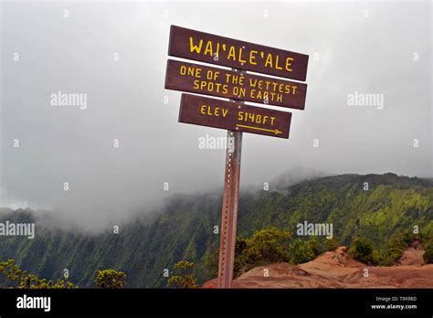 Sign At Kalalau Valley Lookout Showing The Direction Of Mount Waialeale