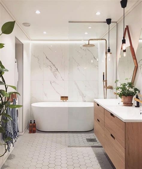 This warm and cozy bathroom features beautiful granite countertops and maple decora cabinets, a jacuzzi tub and a steam shower. 27+ Elegant White Bathroom Ideas to Inspire Your Home ...