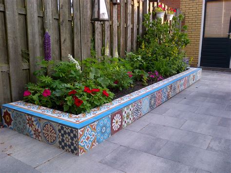 Some Left Over Cement Tiles Create A Great And Happy Border In Your