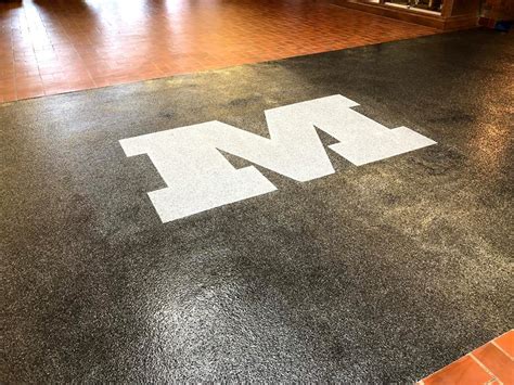 Free estimates from local concrete contractors in your area. Epoxy Flake Flooring with Logo on University Floor- Peoria ...