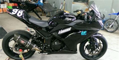 Kawasaki's profilation of this bike. 2013 Kawasaki Ninja 300 race track bike ohlins scotts race ...