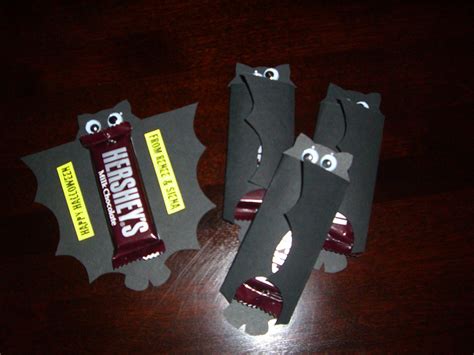 Glue on googly eyes, fold the paper up and . Home Confetti: Craft Test: Bat Candy Wrappers