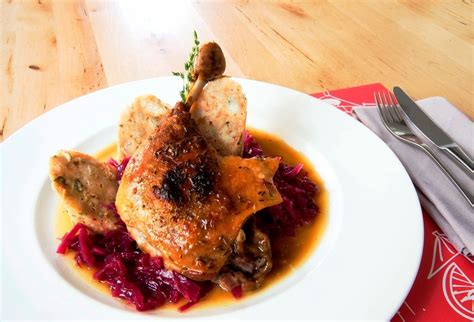 Confit Of Duck Leg With Red Cabbage Dumplings And A Strong Duck Jus