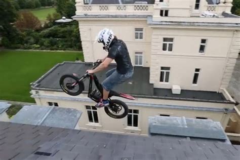 Video Daredevil Biker Jumps Between Ledges On Roof Of Abandoned £100m