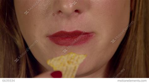 Slow Motion Close Up Woman Eating Chips Stock Video Footage 6639334
