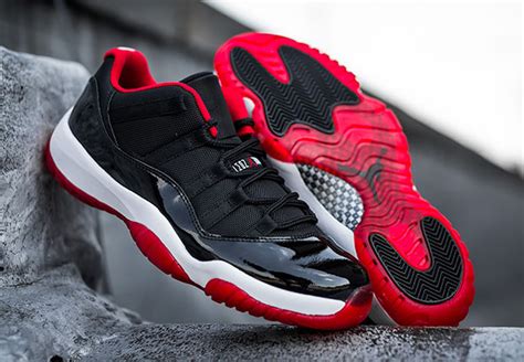 This nike air jordan 11 low fuses two of the silhouette's most iconic colorways — the black and white concord and the black and red buy: A Detailed Look At The Air Jordan 11 Low "Bred ...