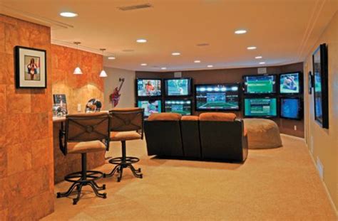 The main area of the man cave. 63 Finished Basement "Man Cave" Designs (AWESOME PICTURES)