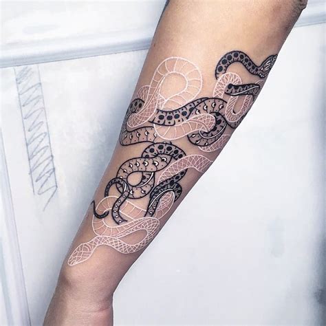 Mesmerizing New Serpentine Tattoos by Mirko Sata | Colossal