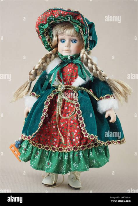 Vintage Porcelain Doll Girl Blonde With Braids With Blue Eyes In A