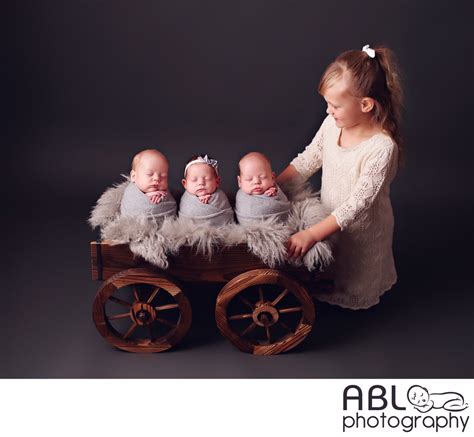 Newborn Photos With Older Siblings Triplets Photo Shoot San Diego