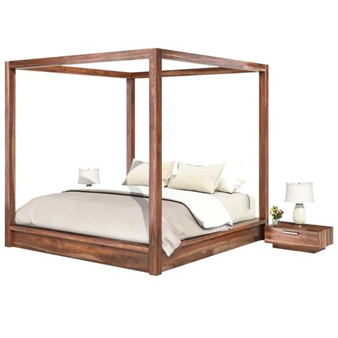 A canopy bed with a simple wood frame is the centerpiece. Hampshire Solid Wood Contemporary Platform Canopy Bed