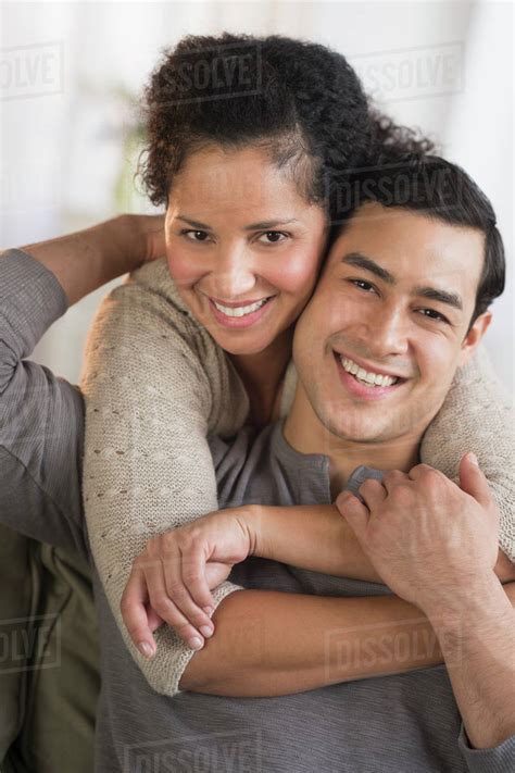 Portrait Of Happy Couple Embracing Stock Photo Dissolve