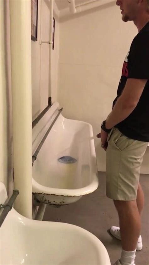 Cute Guy Pissing At The Urinal