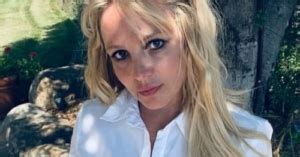 Britney Spears Strips Down And Wears A Red Thong Theurbanspotlight Com