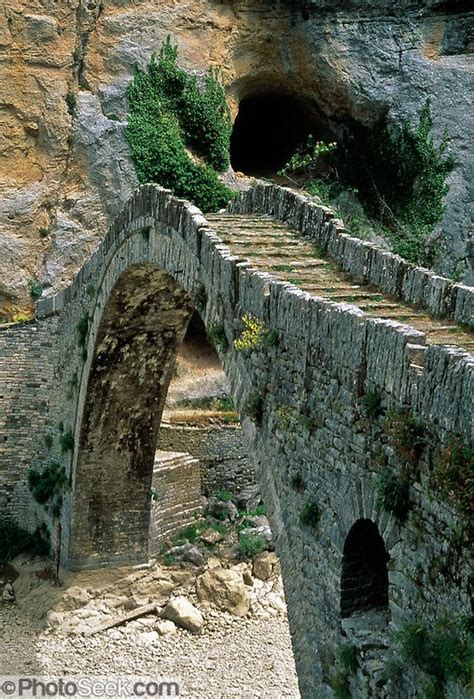 An Arched Stone Bridge 300 Years Old Crosses A Ravine Near Kipi