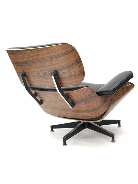 Lot - EAMES LOUNGE CHAIR AND OTTOMAN REPLICA