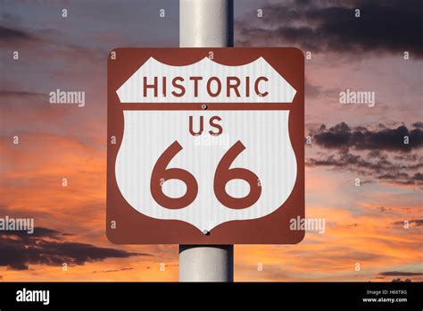 Historic Us Route 66 Highway Sign With Sunset Sky Stock Photo Alamy