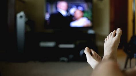 Bare Feet On Couch Watching Tv Stock Video Footage Storyblocks