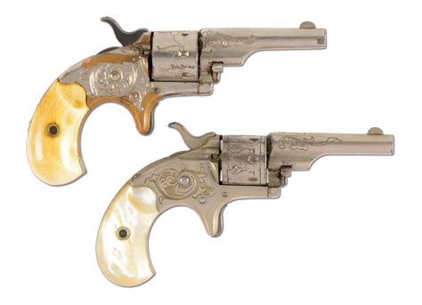 Lot Detail A Lot Of Two Pair Of Colt 22 Open Top Revolvers