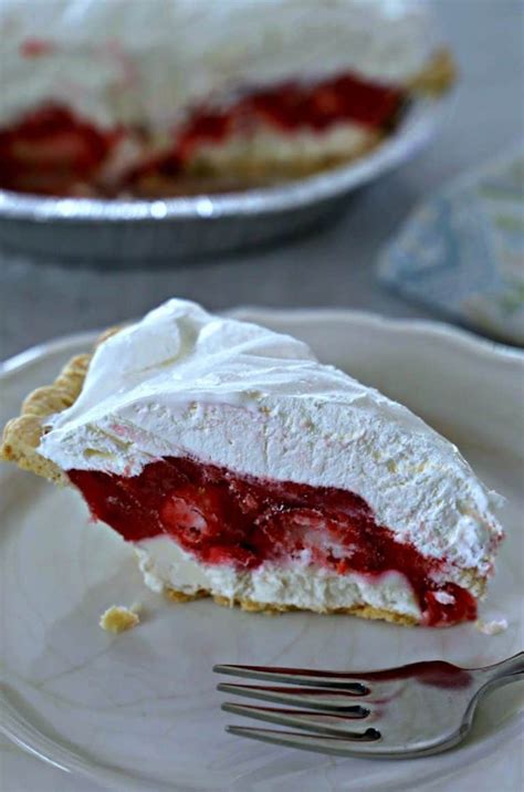 Wash and slice the peaches. Slice of strawberry pie with a layer of cream cheese and ...