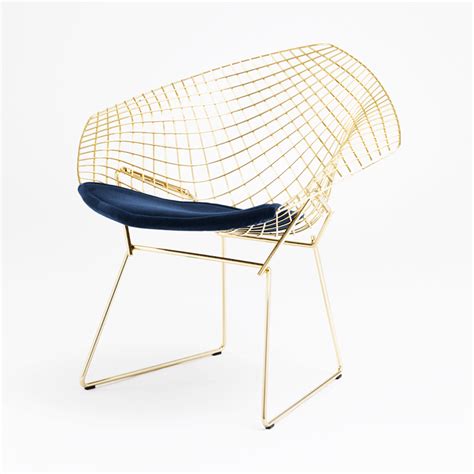 The diamond chair is an astounding study in space, form and function by one of the master sculptors of the last century. Bertoia Diamond Chair in Gold | Knoll