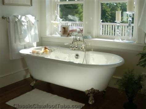 Moreover, the intricate details of the claw feet and the sheer grandeur of the bath provide the splash of vintage charm. Gorgeous bathroom with a double ended clawfoot tub ...