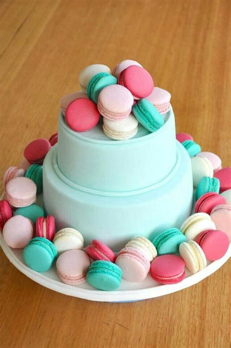 A baby salted caramel cake with krispy kremes, homemade champagne macarons and seven kinds of fudge. 2 tier cake with macaroons | Macaron cake, Macaroon cake ...