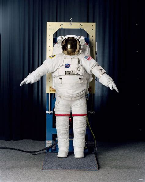 Demonstrating The Contemporary Eva Spacesuit Used By Nasa Astronauts