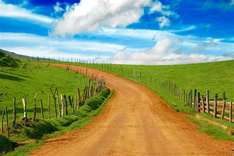 Beautiful Meadow And Dirt Road Stock Photo Image Of Beautiful