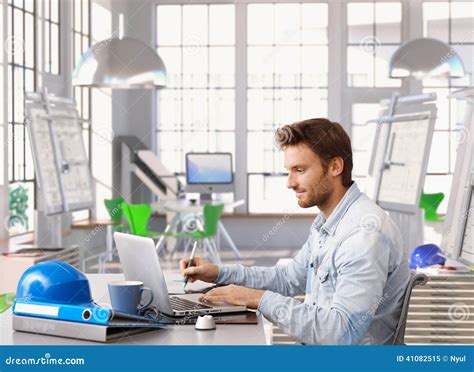 Young Architect Working At Office Desk Stock Photo Image 41082515