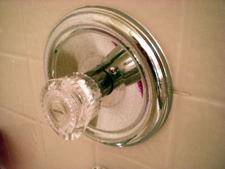 The whole thing rotates 360 so it's not screwed into a box or the ceiling. How-To: Replace A Shower Faucet Cartridge | Toolmonger
