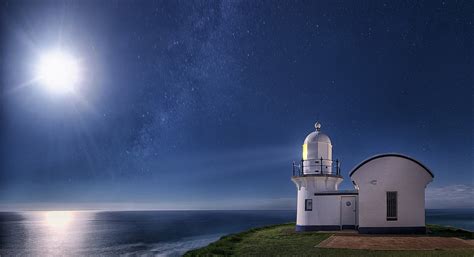 White Lighthouse Near Body Of Water Moon Starry Night Sea Moonlight