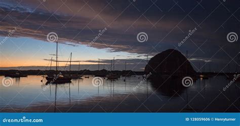 Sunset At Twilight Over Morro Bay Harbor Boats And Morro Rock On The