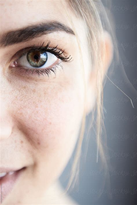 female half face by stocksy contributor guille faingold stocksy