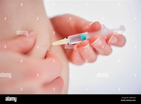 self injection for in vitro fertilisation ivf woman self administering a subcutaneous