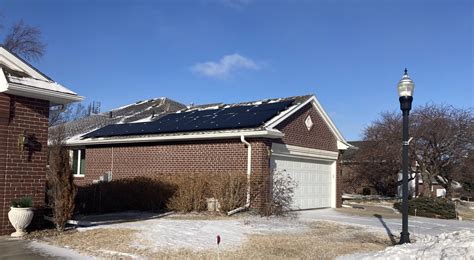 Installation of solar panels gets Lincoln condo owner in hot water