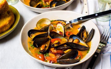 Mussels And Clams In A Spicy Tomato Broth With Bacon Tomato Broth