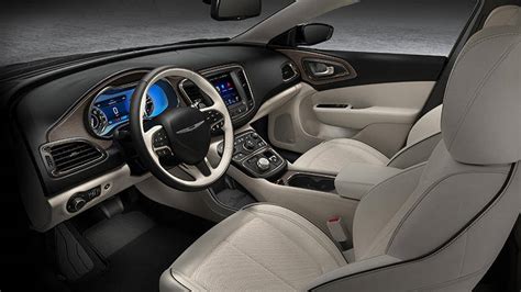 The v6 hustles the 200 up to speed. 2015 Chrysler 200 Review