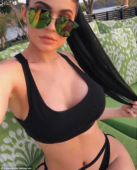 Kylie Jenner Puts On A Busty Display In Tiny Black Bikini Daily Mail Online