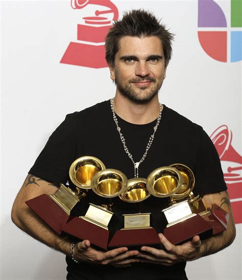 As You Can See In This Picture Juanes Has On Five Latin Grammy Awards