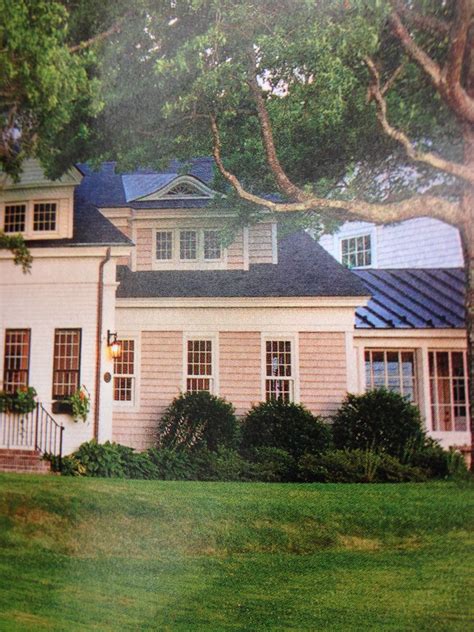 What is this message about? Dormer above center garage bay? I like that it's both a ...