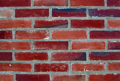 Photographie de mur en briques rouges
