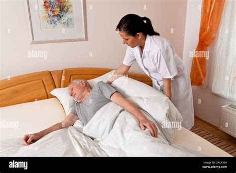 Carer For Elderly Care Of Seniors Stock Photo Alamy