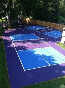 The tennis nets are the backdrops between the ends. Pickleball Court Surfaces | Tennis court backyard ...