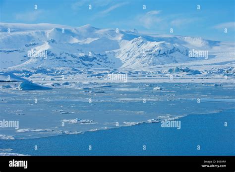 Snowy Mountains Overlooking Arctic Landscape Stock Photo Alamy