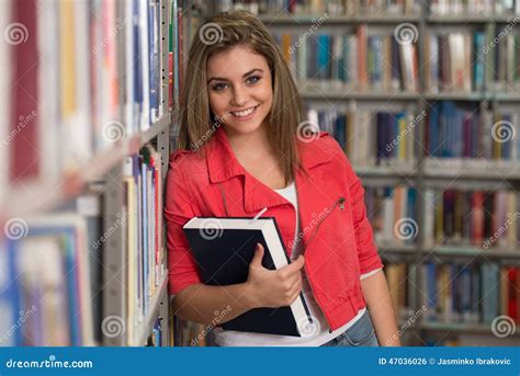 Beautiful Female Student In A University Library Stock Photo Image Of