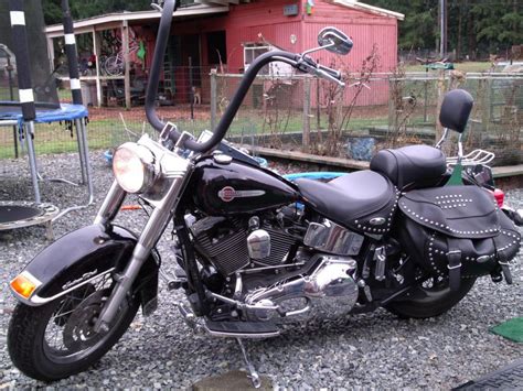 The 2008 heritage softail classic is said to get approximately 54 miles per gallon on the highway and 35.0 in the city in reviews. Buy 2002 Harley-Davidson Heritage Softail Custom on 2040-motos