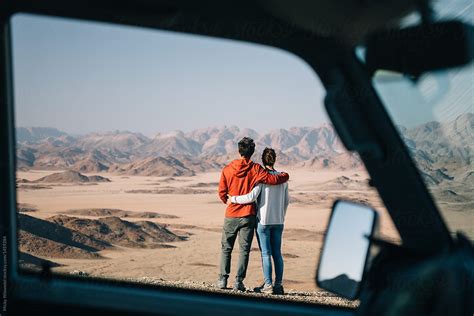 Roadtrip Couple Enjoy Desert View By Stocksy Contributor Juno Stocksy