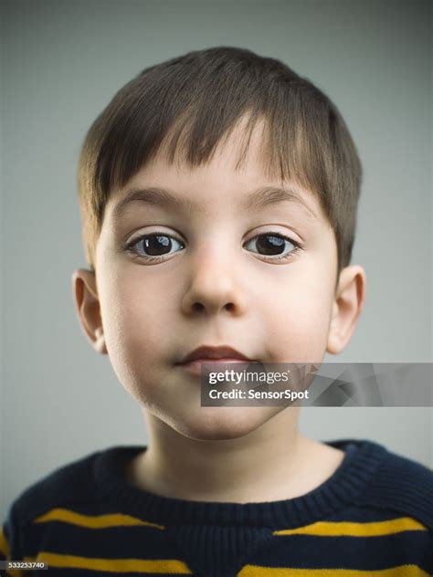 Portrait Of A 4 Years Old Boy With Happy Expression High Res Stock