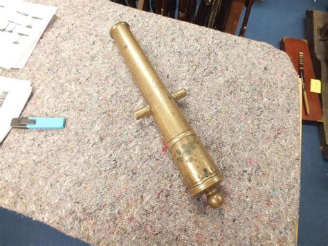 A 19th Century Bronze Signal Cannon 19inch Over All Length Two Stage
